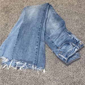 White washed American Eagle super flare jeens